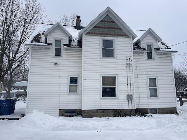 view of snow covered property