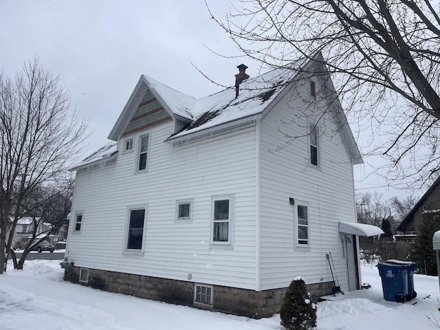 view of snow covered property