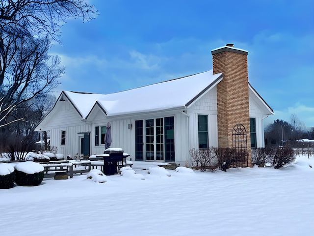 view of snow covered property