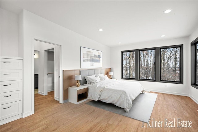 bedroom with light wood-type flooring