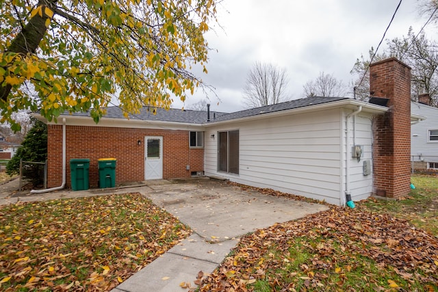 rear view of property with a patio