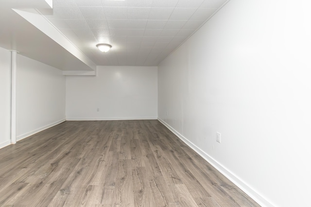 basement with wood-type flooring