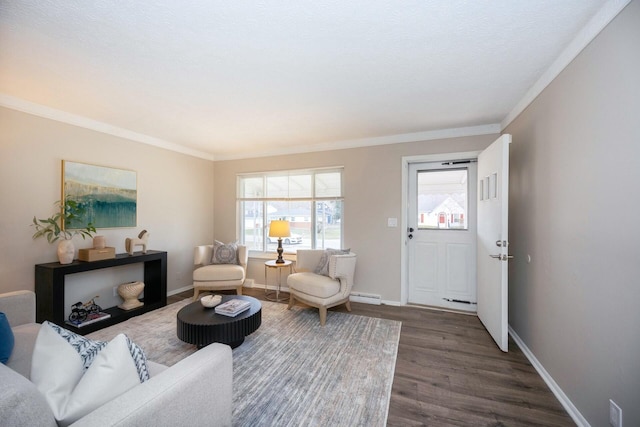 living room featuring baseboard heating, crown molding, and dark hardwood / wood-style floors