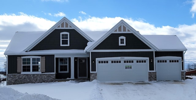 craftsman inspired home featuring a garage