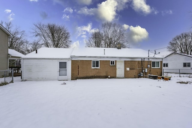 view of snow covered house