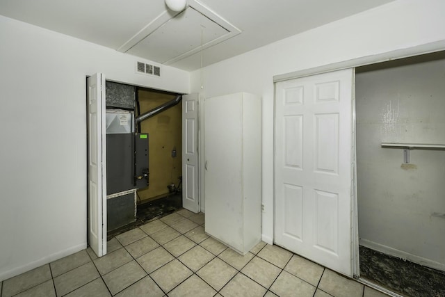 unfurnished bedroom featuring a closet