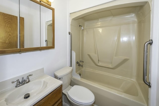 full bathroom featuring tub / shower combination, vanity, and toilet