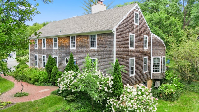 view of property exterior featuring a yard