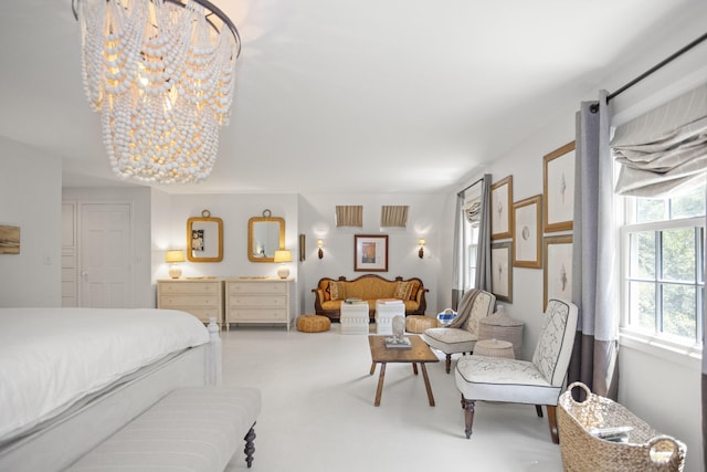 bedroom featuring an inviting chandelier