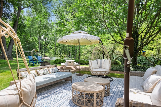 view of patio / terrace with a playground and an outdoor hangout area