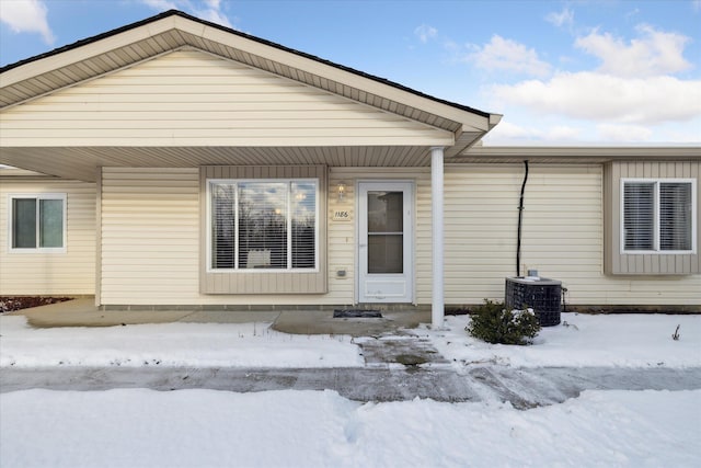 view of front of property with central AC unit