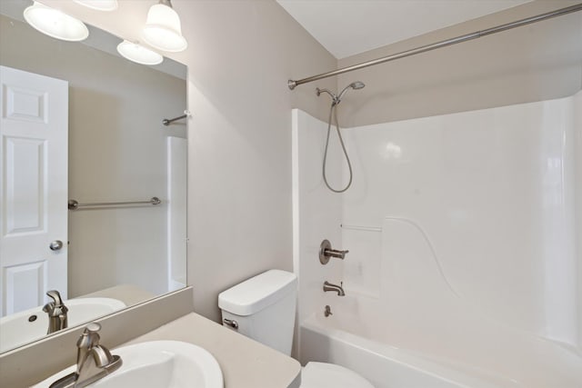 full bathroom featuring shower / washtub combination, vanity, and toilet