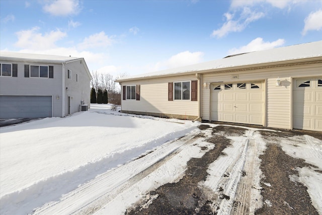 ranch-style house with central AC unit