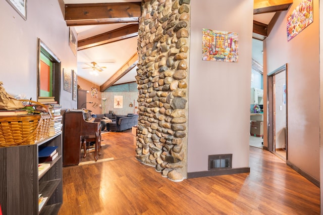 hall featuring beam ceiling, wood-type flooring, and high vaulted ceiling