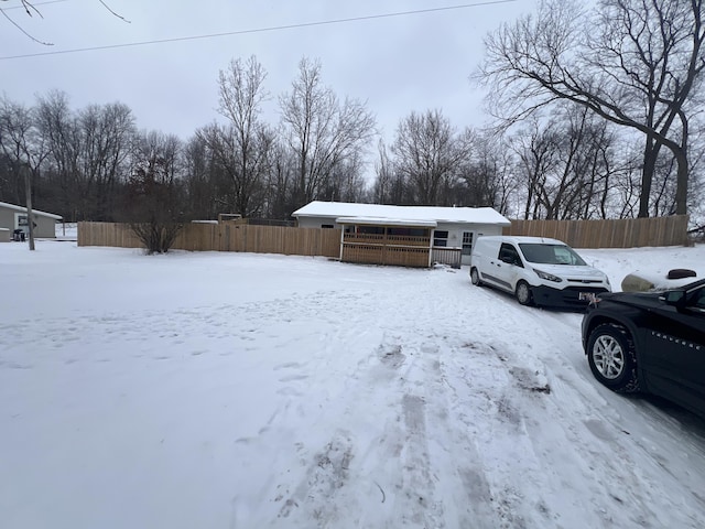 view of front of house featuring a wooden deck