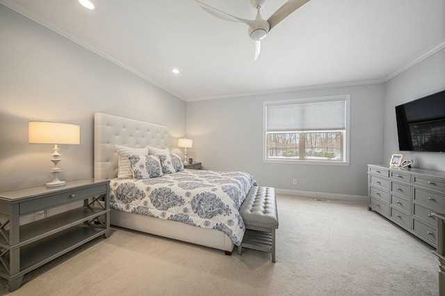 bedroom with ceiling fan, crown molding, and light carpet