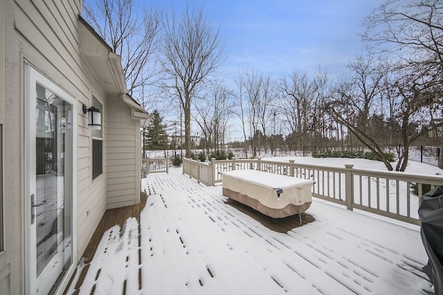 view of snow covered deck