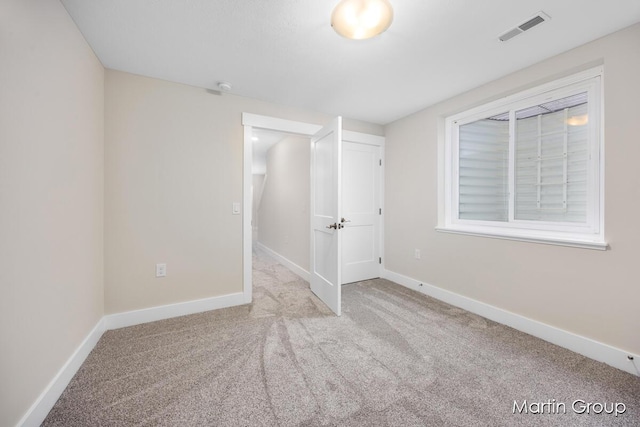 unfurnished bedroom with light carpet