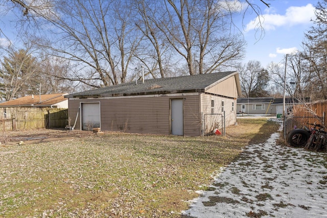 garage with a yard