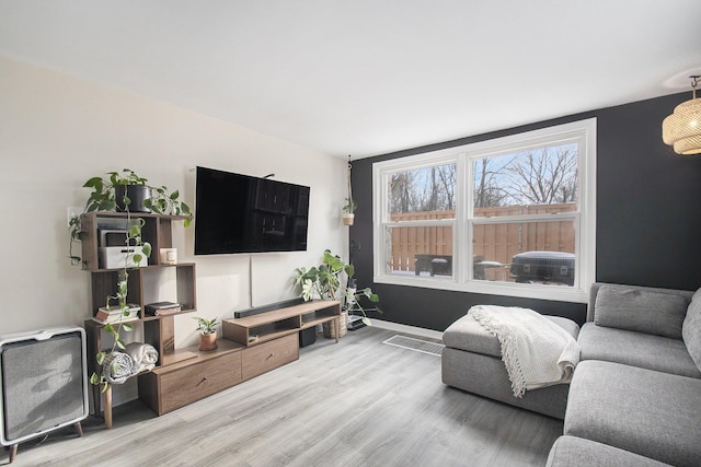 living room with wood-type flooring