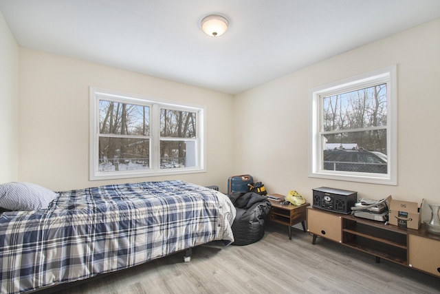 bedroom with hardwood / wood-style flooring