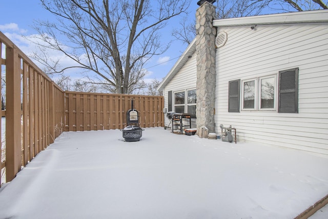 exterior space with an outdoor fire pit