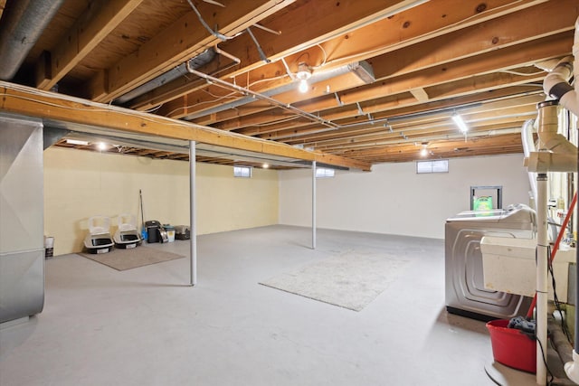 basement featuring washing machine and dryer