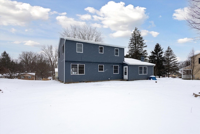 view of snow covered property