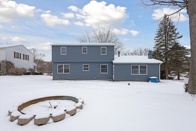 view of snow covered property