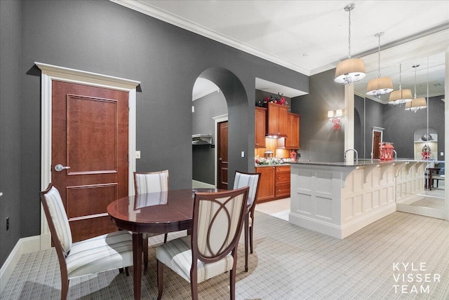 dining area featuring ornamental molding