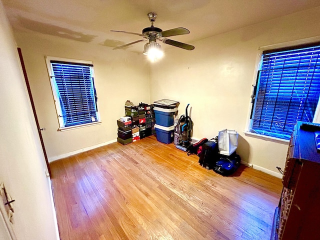 interior space featuring hardwood / wood-style flooring and ceiling fan