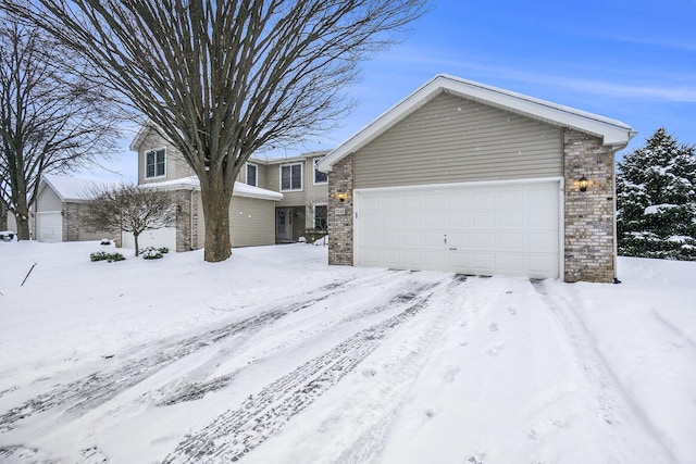 view of front of home with a garage