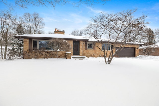 single story home with a garage