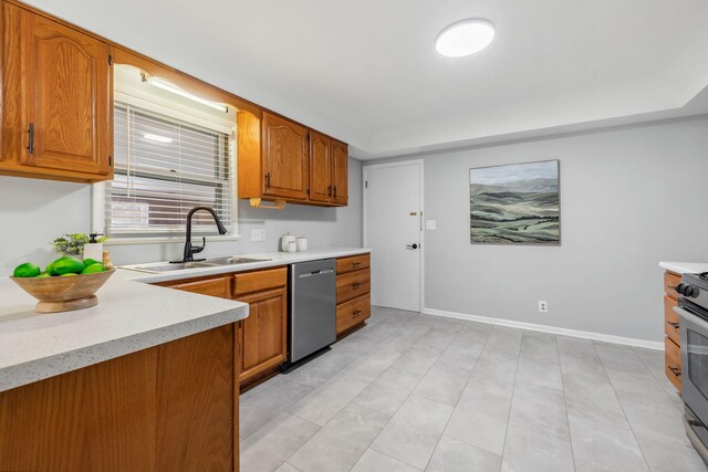 kitchen with appliances with stainless steel finishes and sink