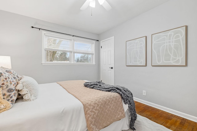 bedroom featuring ceiling fan and wood-type flooring