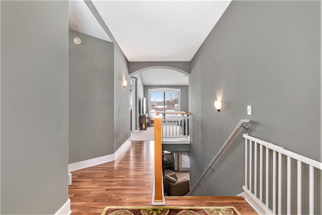 hallway featuring wood-type flooring