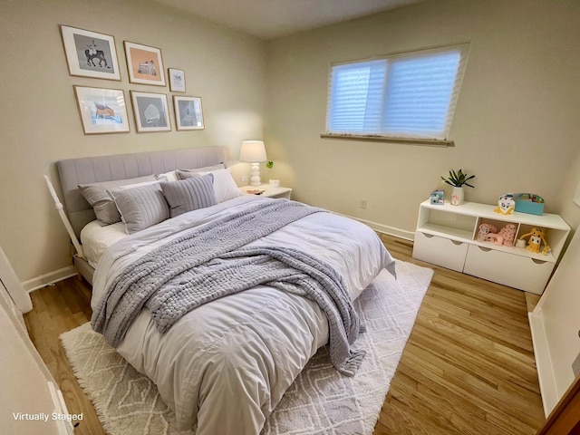 bedroom featuring light hardwood / wood-style flooring