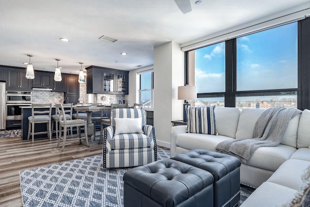 living room featuring dark hardwood / wood-style flooring