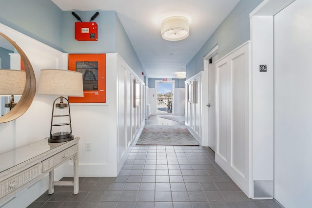 hallway featuring tile patterned floors