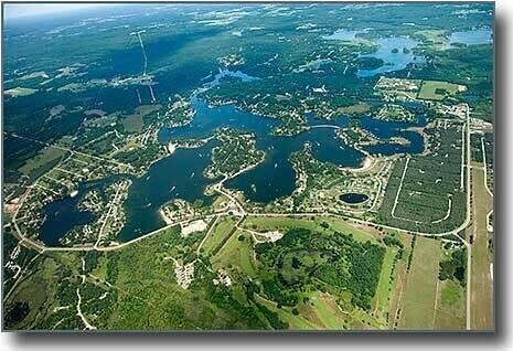 7519 9th St Unit 311, Canadian Lakes, MI 49346 - drone / aerial view