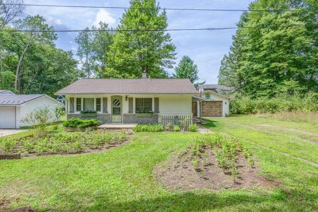 7519 9th St Unit 311, Canadian Lakes, MI 49346 - ranch-style home featuring a garage, a porch, and a front yard