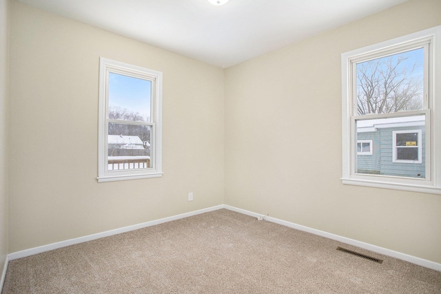 view of carpeted spare room