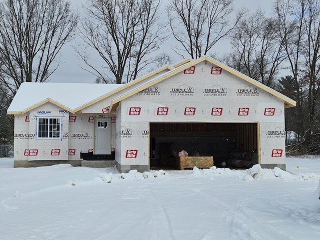 property in mid-construction featuring a garage