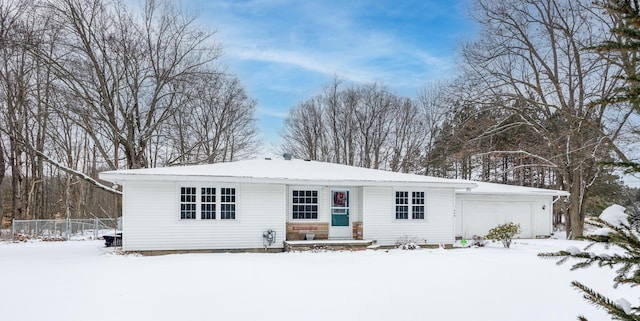 ranch-style house featuring a garage