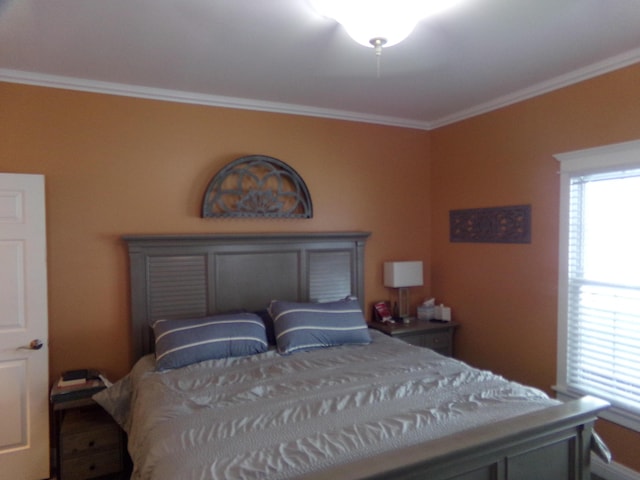 bedroom featuring ornamental molding