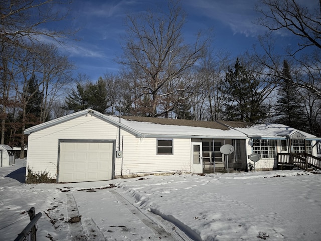 single story home featuring a garage