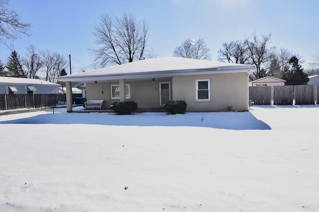 view of snow covered property