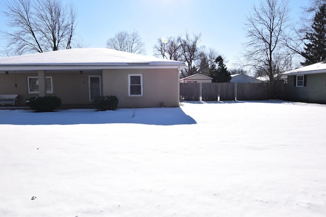 view of snow covered property