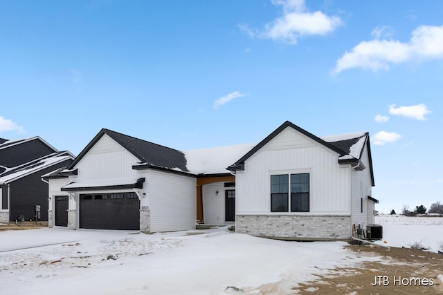 modern farmhouse style home with a garage