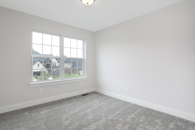 view of carpeted spare room